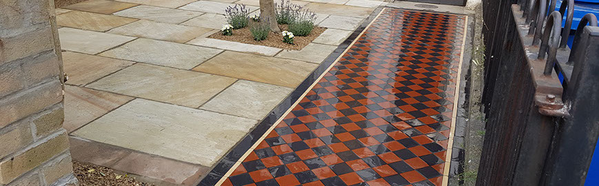 Joseph Mat Landscape,  featheredge fence ,  sandstone paving, beds, brick step