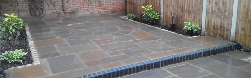 Joseph Mat Landscape,  featheredge fence ,  sandstone paving, beds, brick step