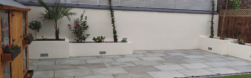 Joseph Mat Landscape, , sawn sandstone paving, rendered raised beds, costwold chippings garden