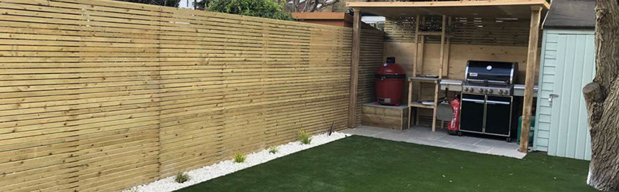 Joseph Mat Landscape,  featheredge fence ,  sandstone paving, beds, brick step